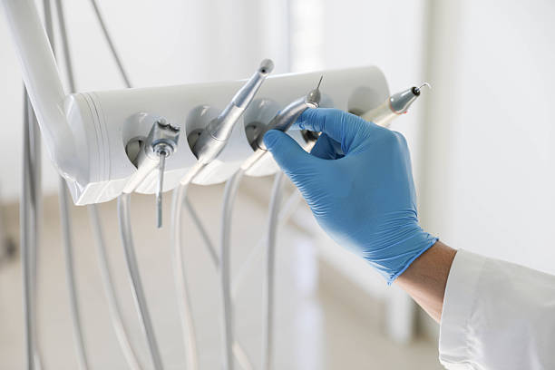 Professional Tooth Extraction technician working in Sandston, VA